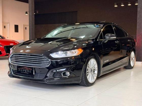 FORD FUSION 2.0 TITANIUM 16V HÍBRIDO 4P AUTOMÁTICO FORD FUSION 2.0 TITANIUM 16V HÍBRIDO 4P AUTOMÁTICO